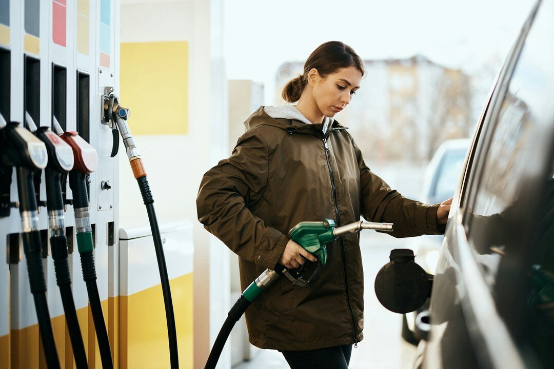 woman driver at a gas station