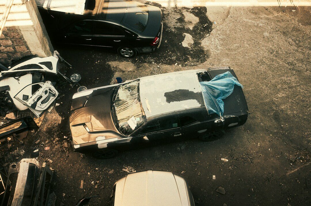 an aerial view of the broken car