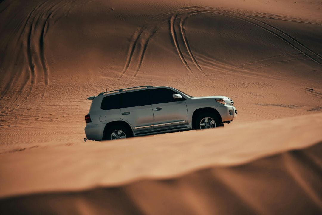 car driving in a desert