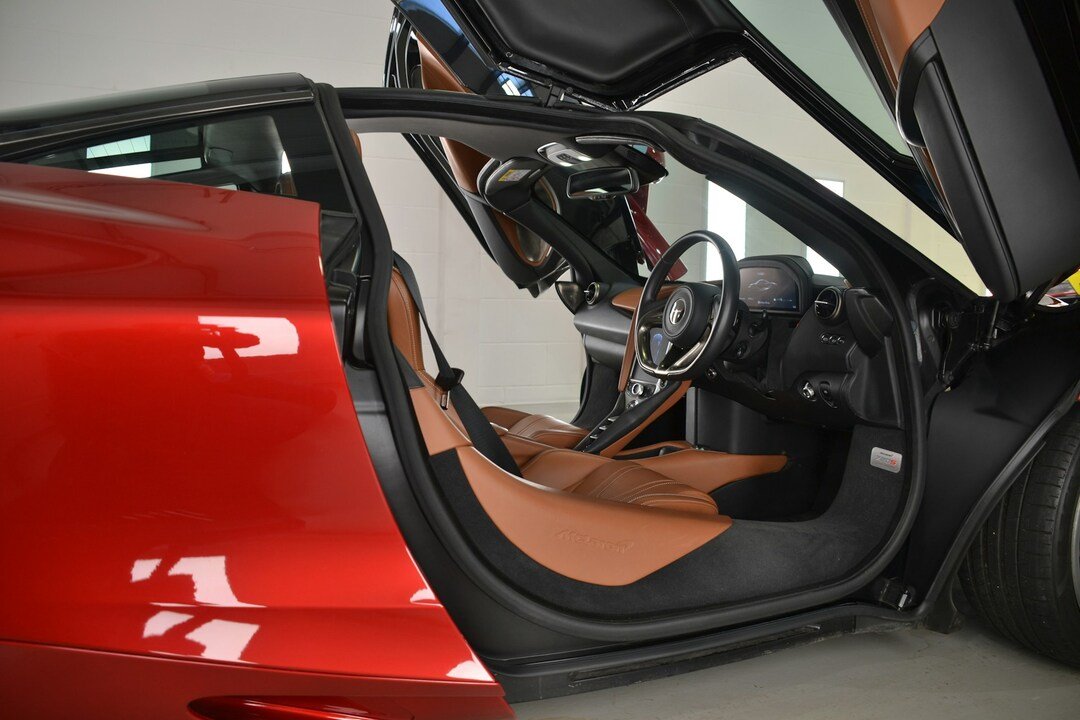 car with open doors and roof