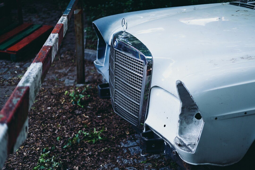 slightly damaged vintage car