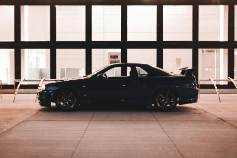 car near a dealer showroom