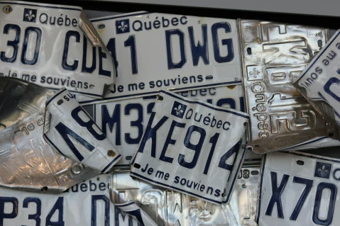 bent and damaged license plates